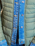 Green puffer jacket with blue denim trim