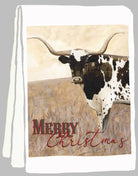 White Kitchen Towel with a longhorn cow and 'Merry Christmas' text on a beige background