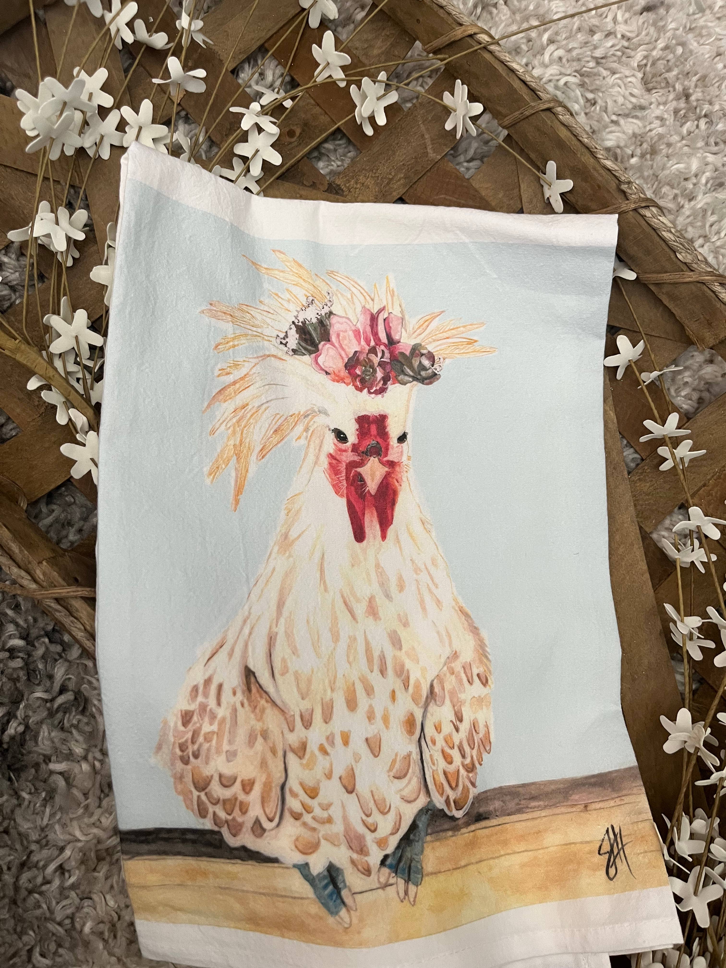 Towel with a rooster design on a decorative background