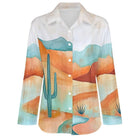 Shirt with desert landscape and cactus design on a white background