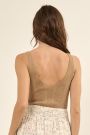 Women wearing a tank top in beige scoop back 